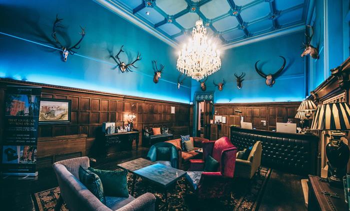 A warm welcome guaranteed when our guests check in at Ruthin Castle